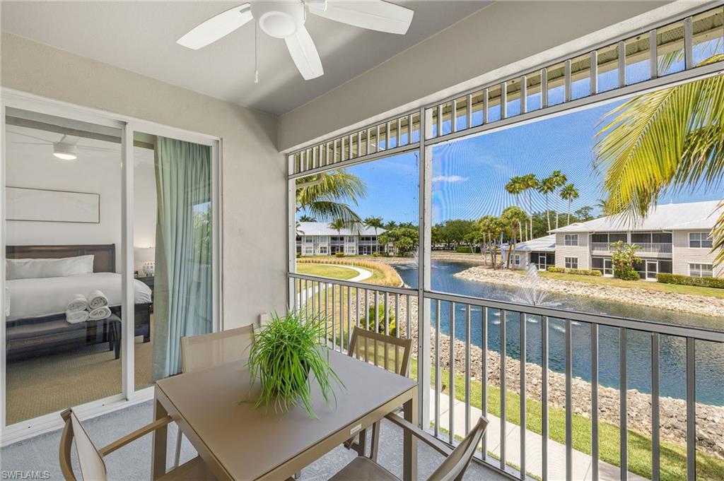 7940 Mahogany Run Lane, Unit 625 Naples, FL 34113 - Photo 2 of 30 a living room with furniture and a large window