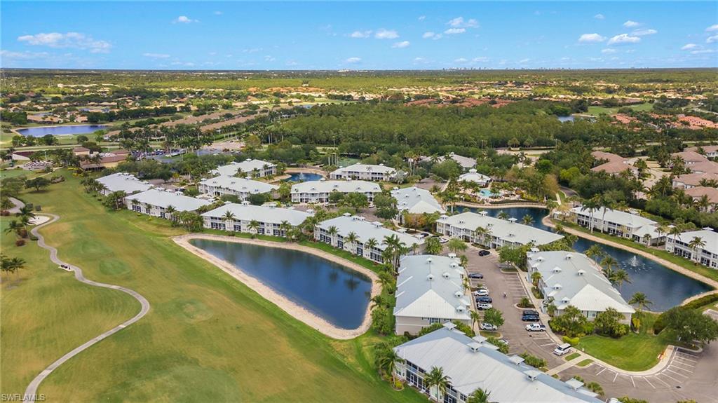 7940 Mahogany Run Lane, Unit 625 Naples, FL 34113 - Photo 26 of 30 an aerial view of residential houses with outdoor space and swimming pool