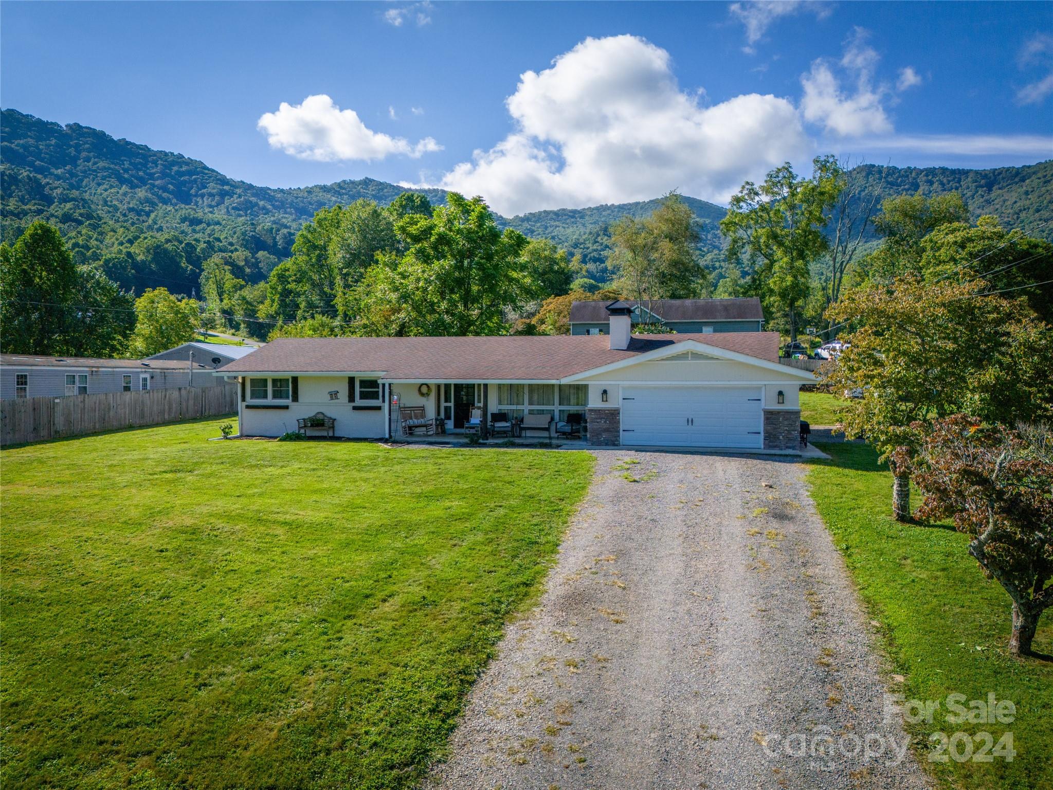 10 Elbert Burnett Road Canton, NC 28716 - Photo 1 of 39 a view of a house with a yard