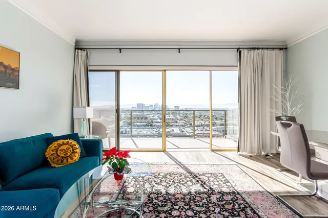 a living room with a couch and a table