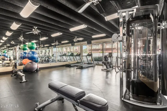 a view of a studio with wooden floor
