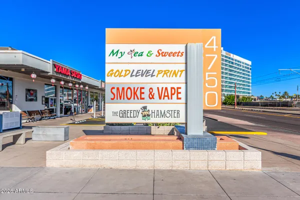 a sign that is on the side of a building