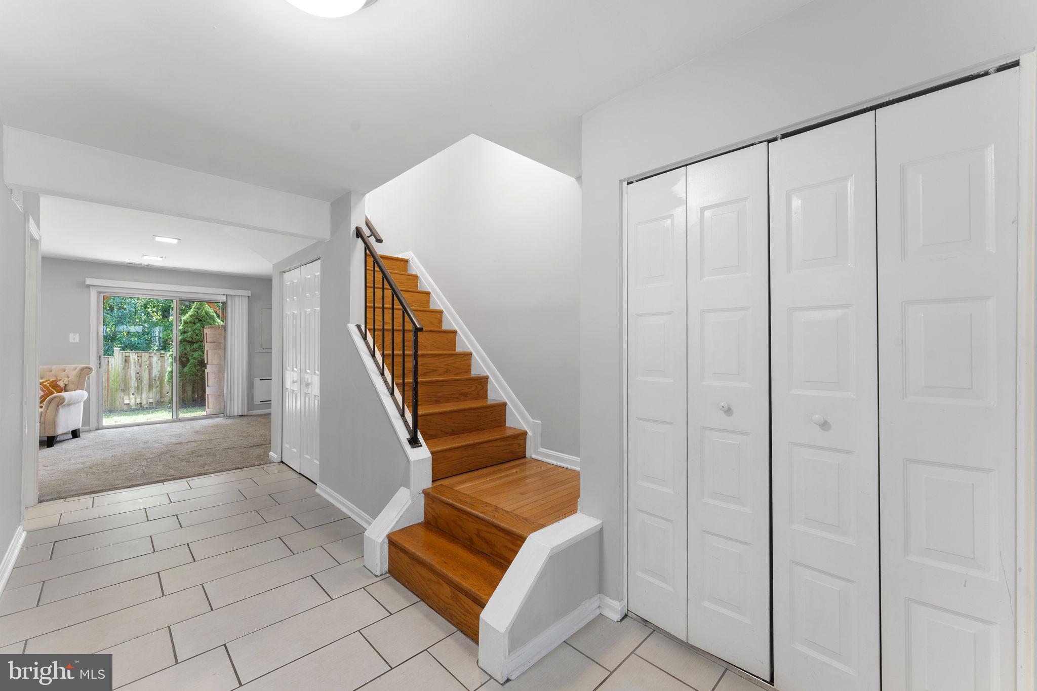 7359 Rokeby Drive Manassas, VA 20109 - Photo 11 of 44 Hardwood staircase to Upper levels