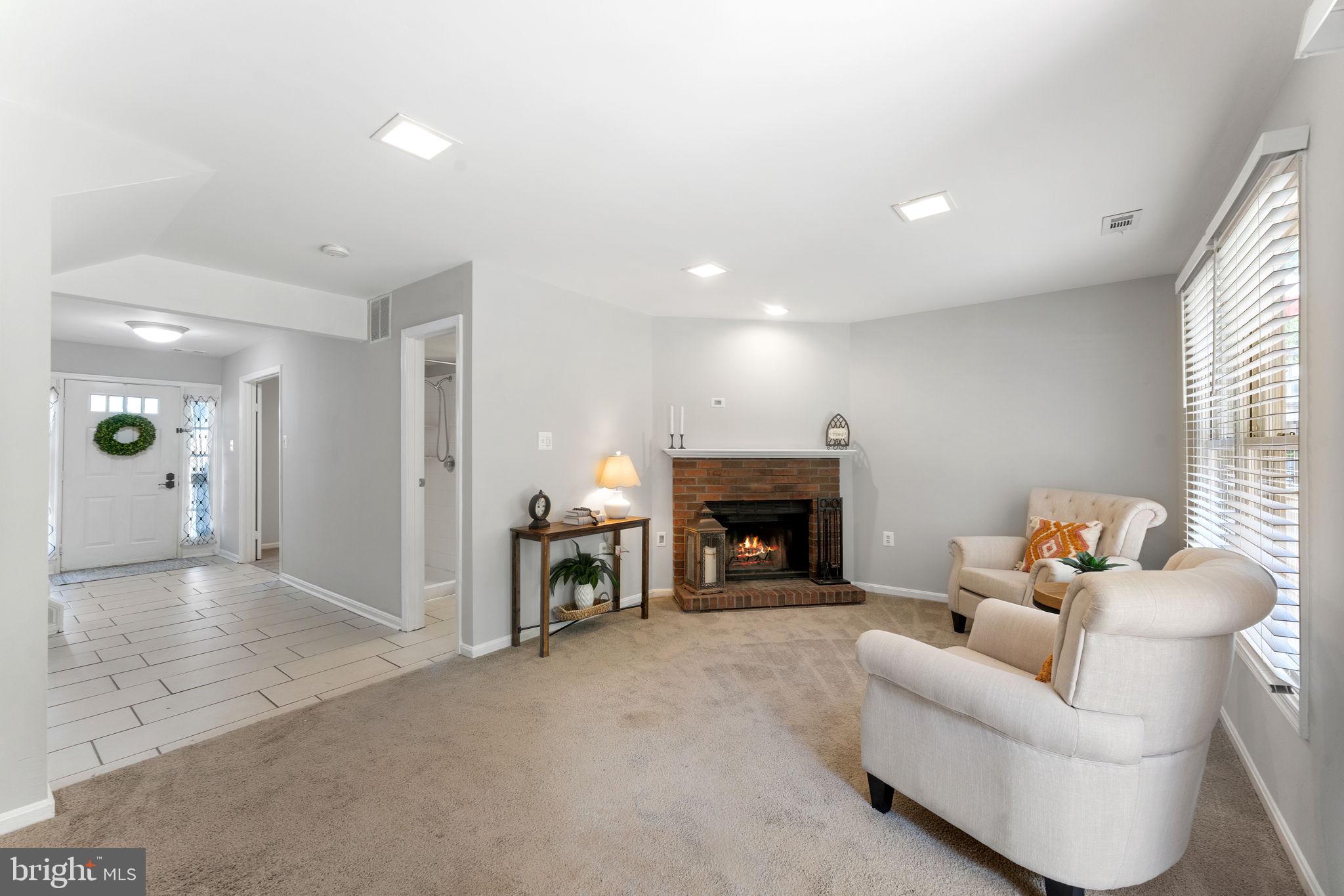 7359 Rokeby Drive Manassas, VA 20109 - Photo 6 of 44 Main Level Recreation Rm w/ wood burning fireplace