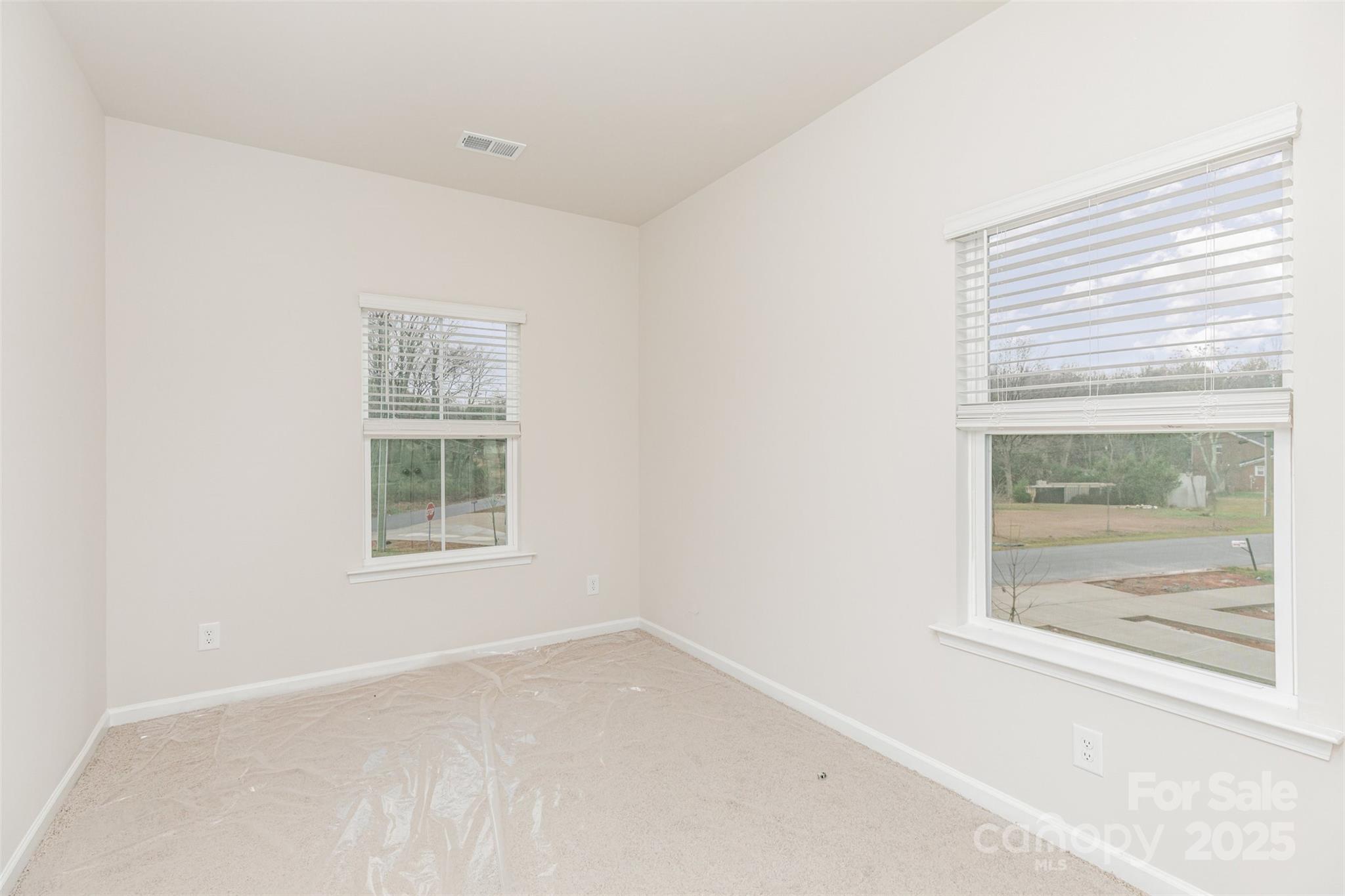 7304 Boswell Road Charlotte, NC 28215 - Photo 24 of 30 an empty room with a window