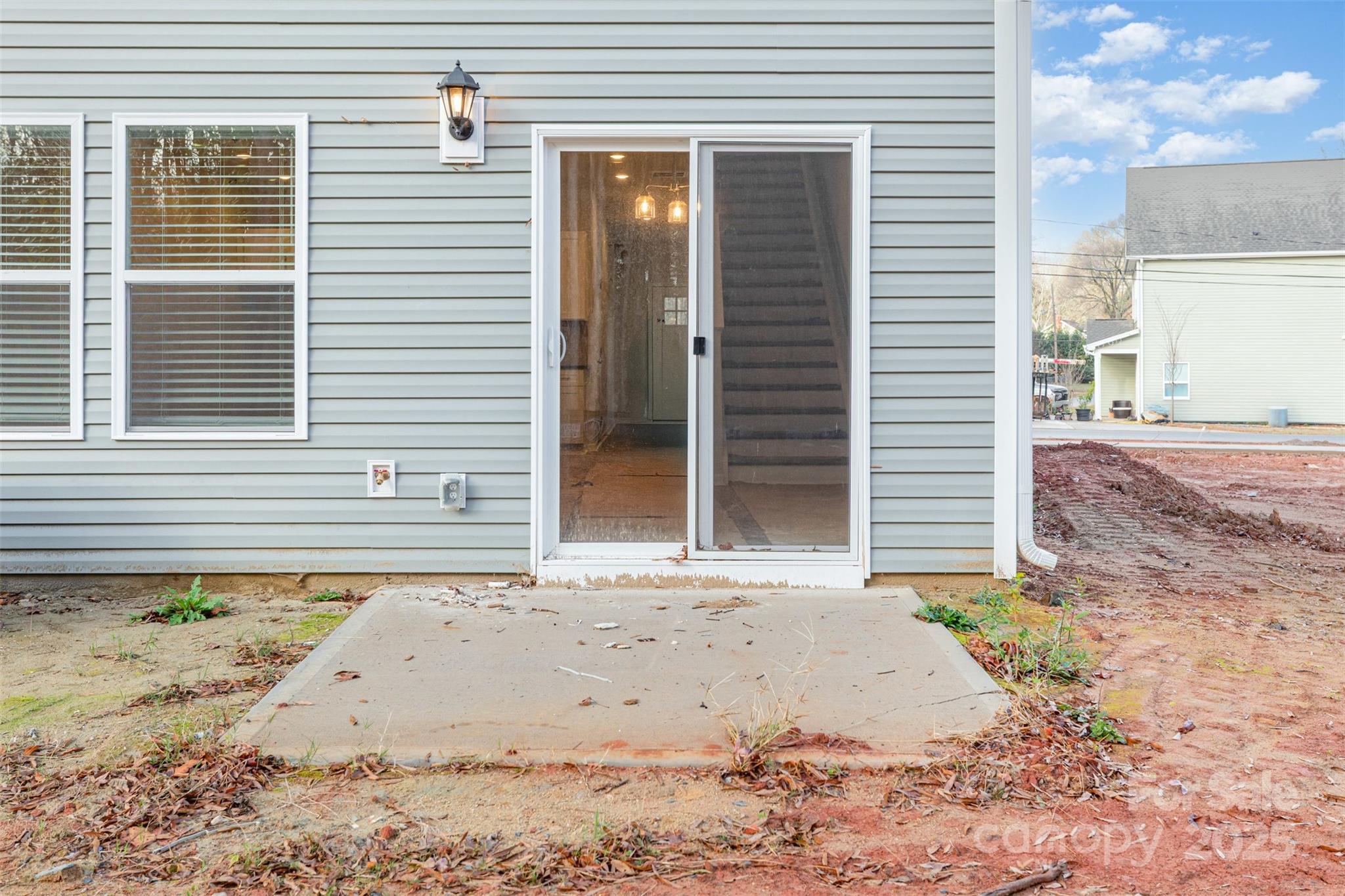 7304 Boswell Road Charlotte, NC 28215 - Photo 28 of 30 a view of a house with a yard