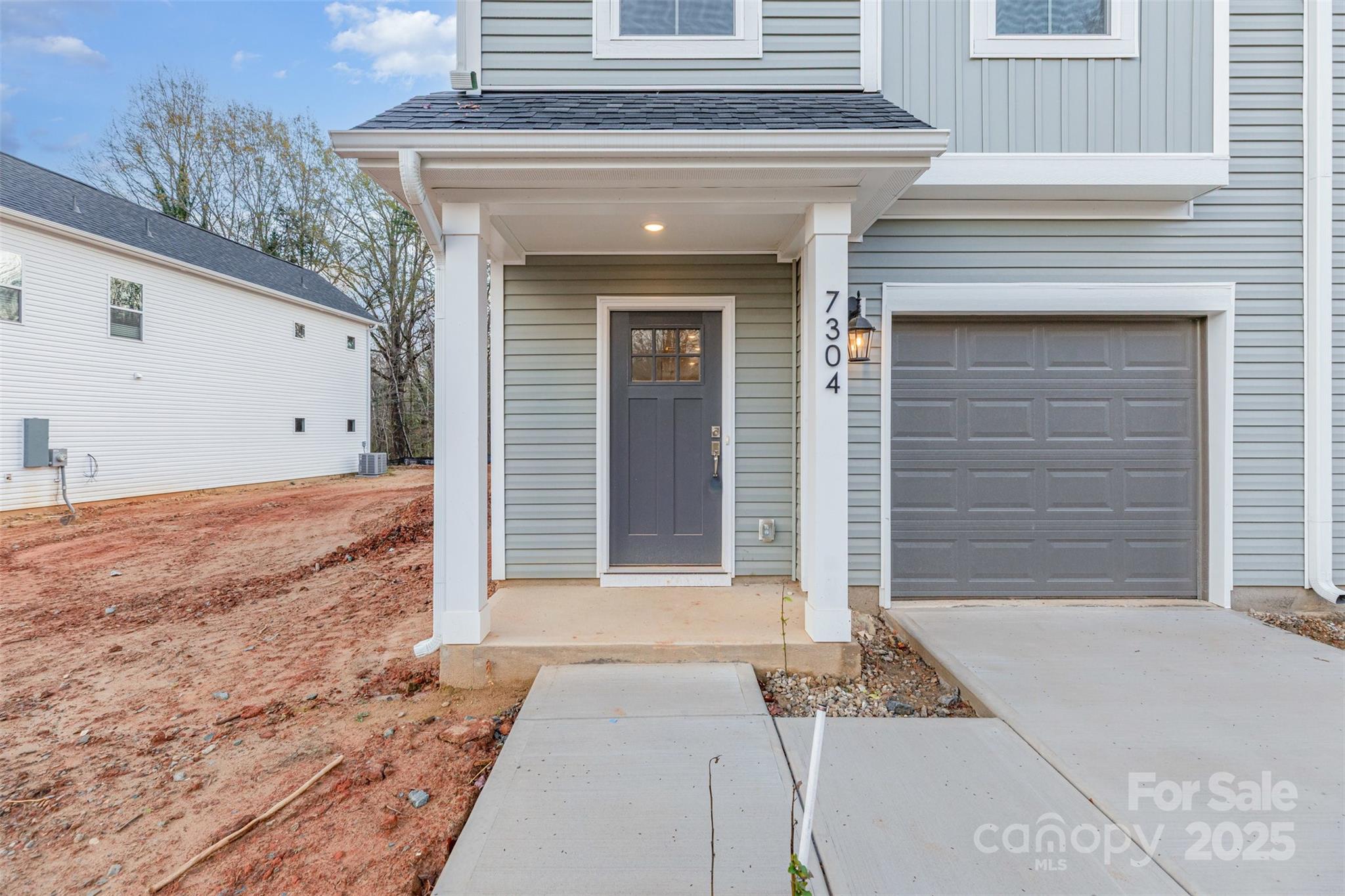7304 Boswell Road Charlotte, NC 28215 - Photo 3 of 30 a front view of a house