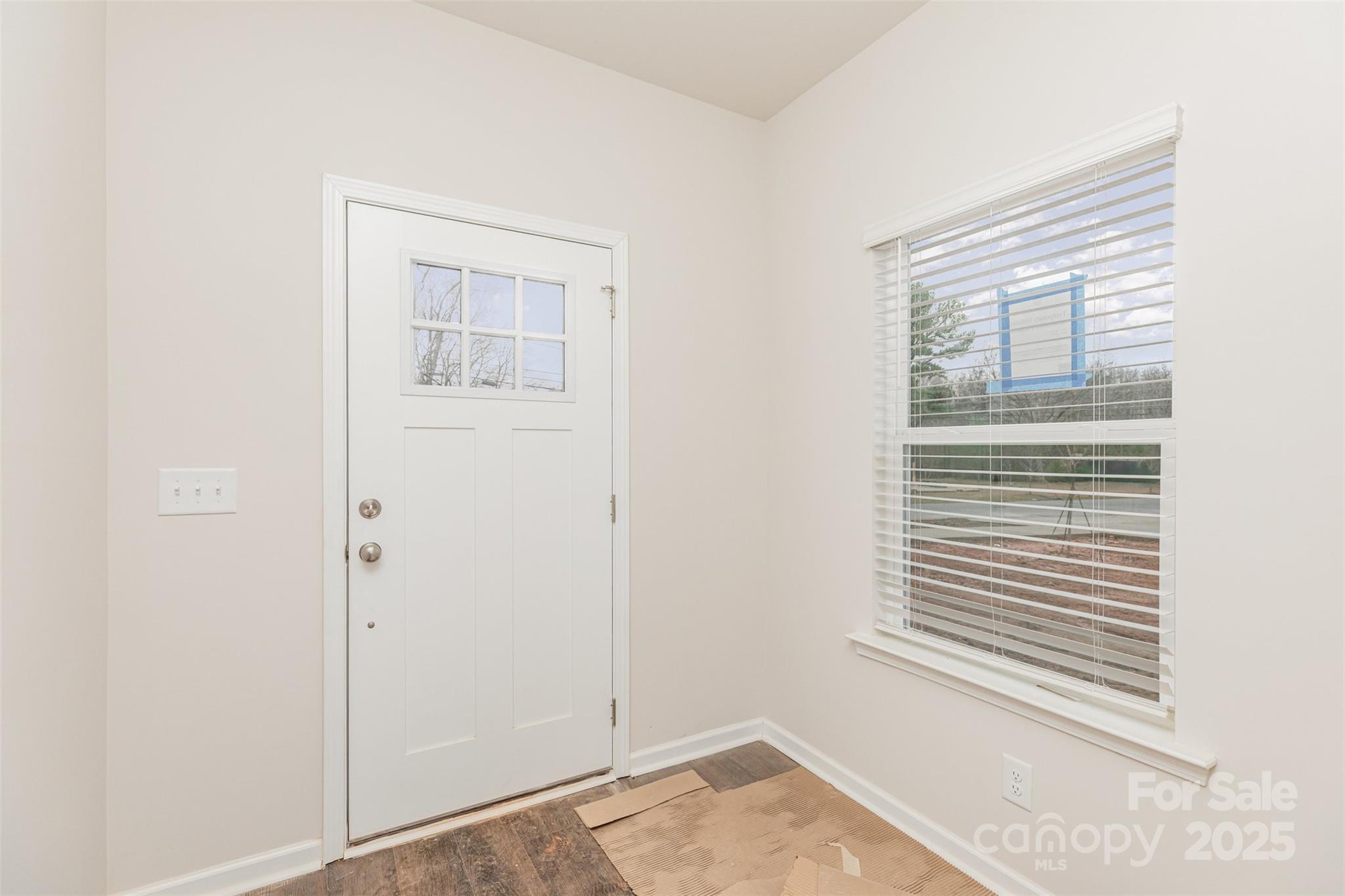 7304 Boswell Road Charlotte, NC 28215 - Photo 5 of 30 a view of a small space with a window