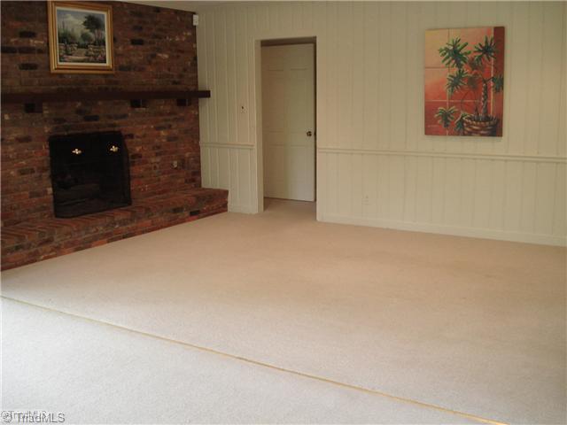 Den/Family/Great Room. Main level den w/fireplace