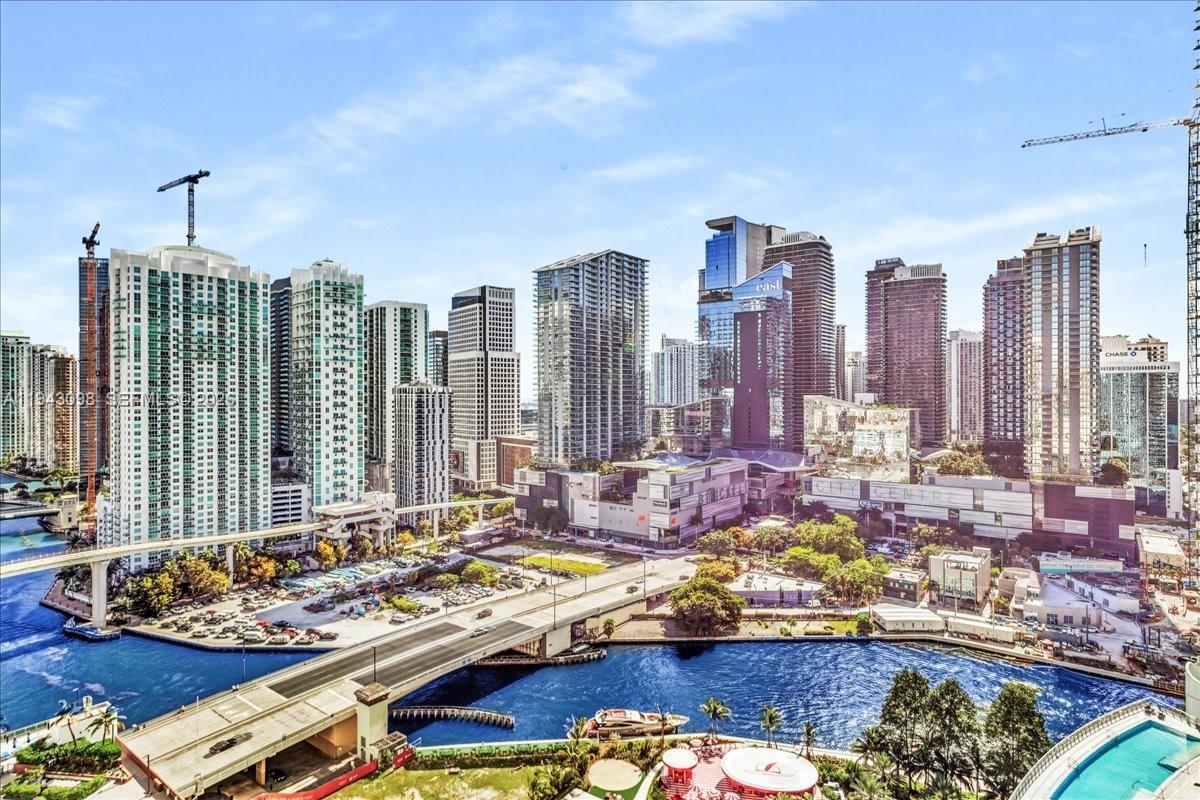 90 Southwest 3rd Street, Unit 2604 Miami, FL 33130 - Photo 19 of 59 a view of swimming pool with outdoor seating