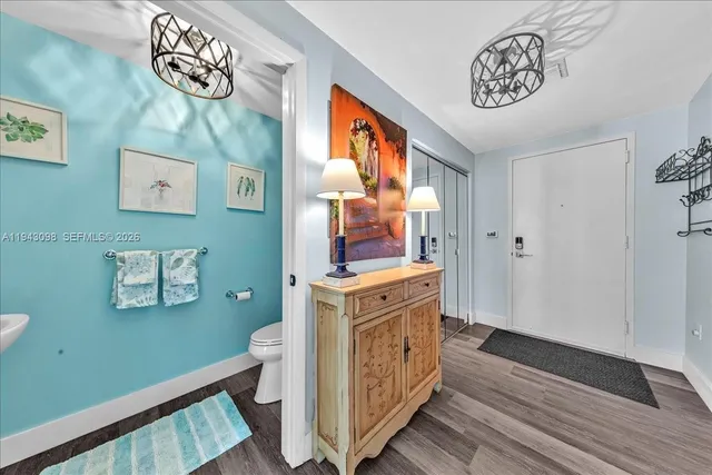 a lobby with furniture and potted plant