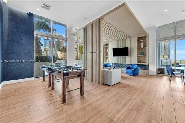 a view of a garden with a building and a park