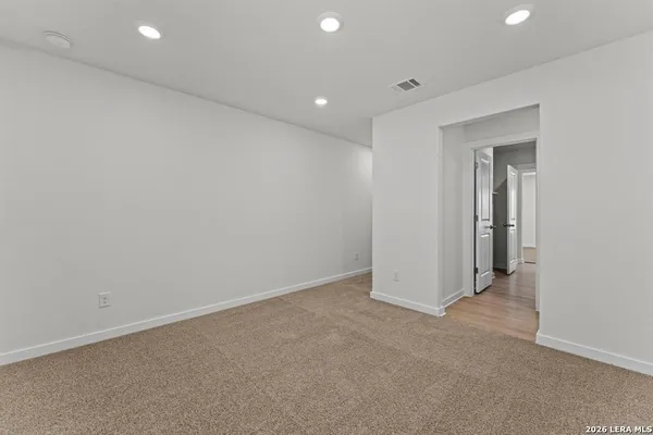 an empty room with a natural light