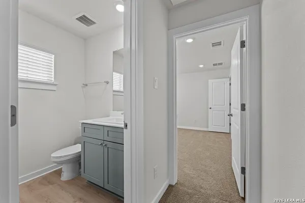 a view of bathroom with a toilet sink