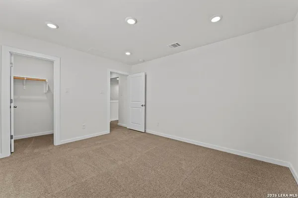 an empty room with an entryway