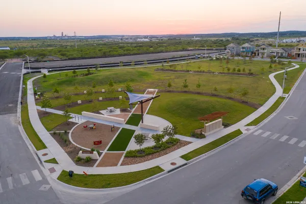a view of a swimming pool with a lake view