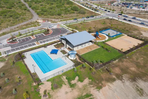 an aerial view of a house with a garden