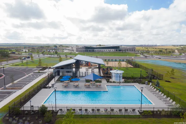 a view of a swimming pool with an ocean view