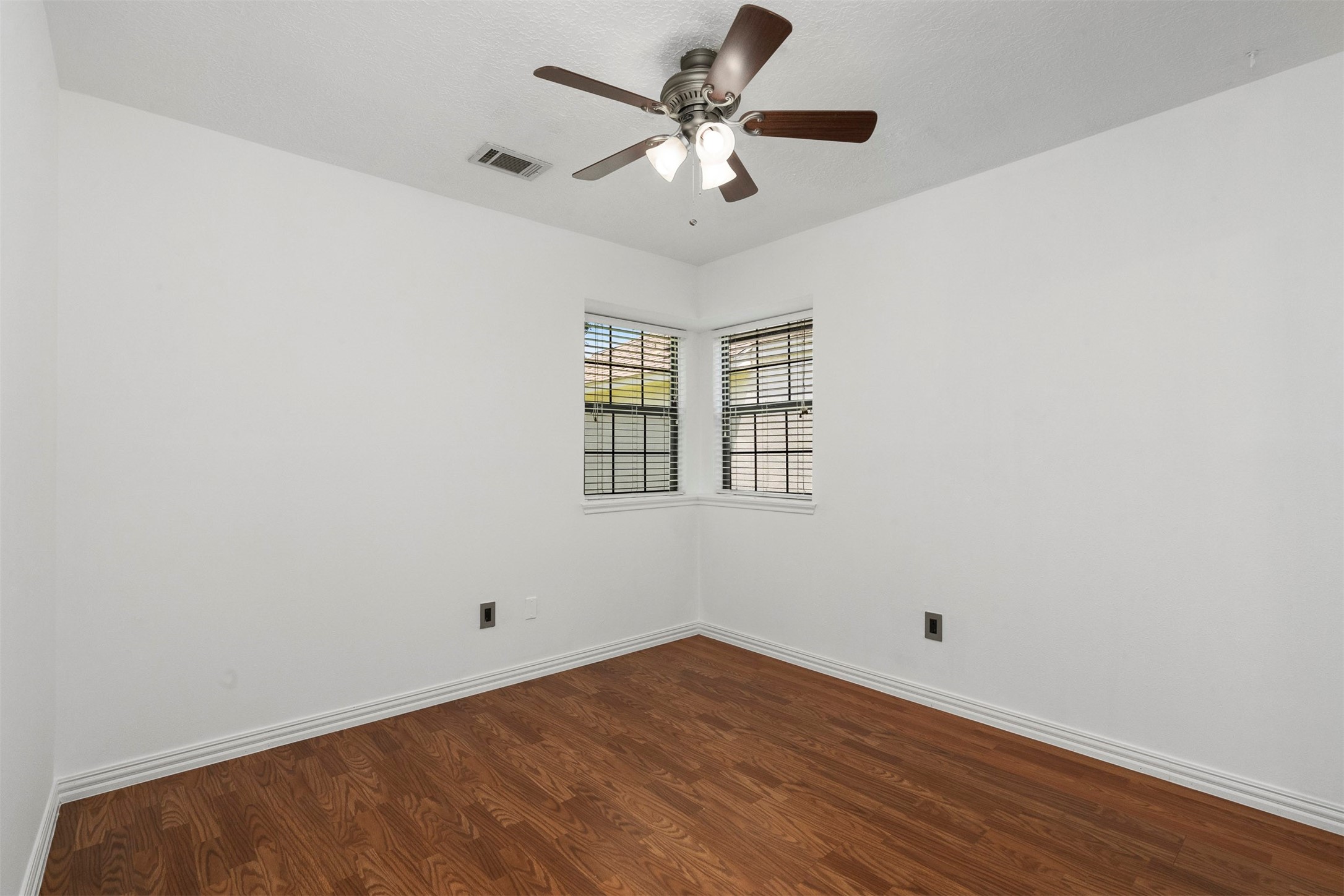 22835 Sherioaks Lane Spring, TX 77389 - Photo 9 of 12 The secondary bedroom also has easy care flooring and a ceiling fan.