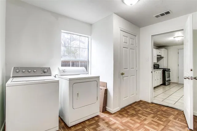 a view of utility room with washer and dryer