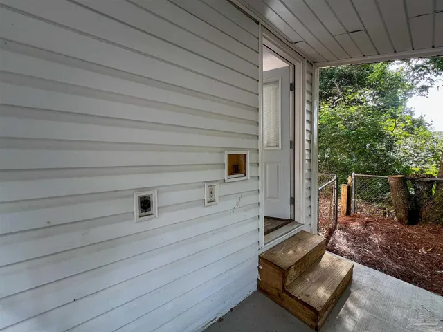 a view of backyard with hardwood