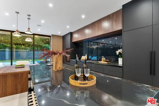 a room with lots of tables and chairs