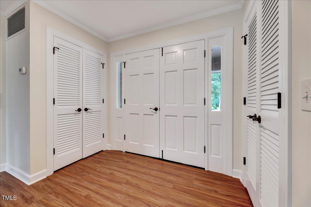 2585 Cabin Branch Road Kinston, NC 28504 - Photo 12 of 42 a view of an empty room with wooden floor