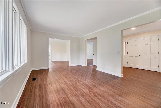 a kitchen with a sink stove and microwave