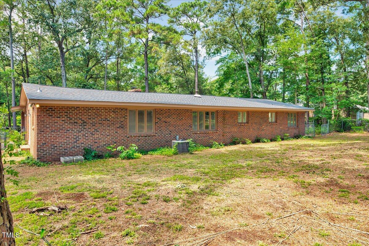 2585 Cabin Branch Road Kinston, NC 28504 - Photo 32 of 42 a view of a backyard