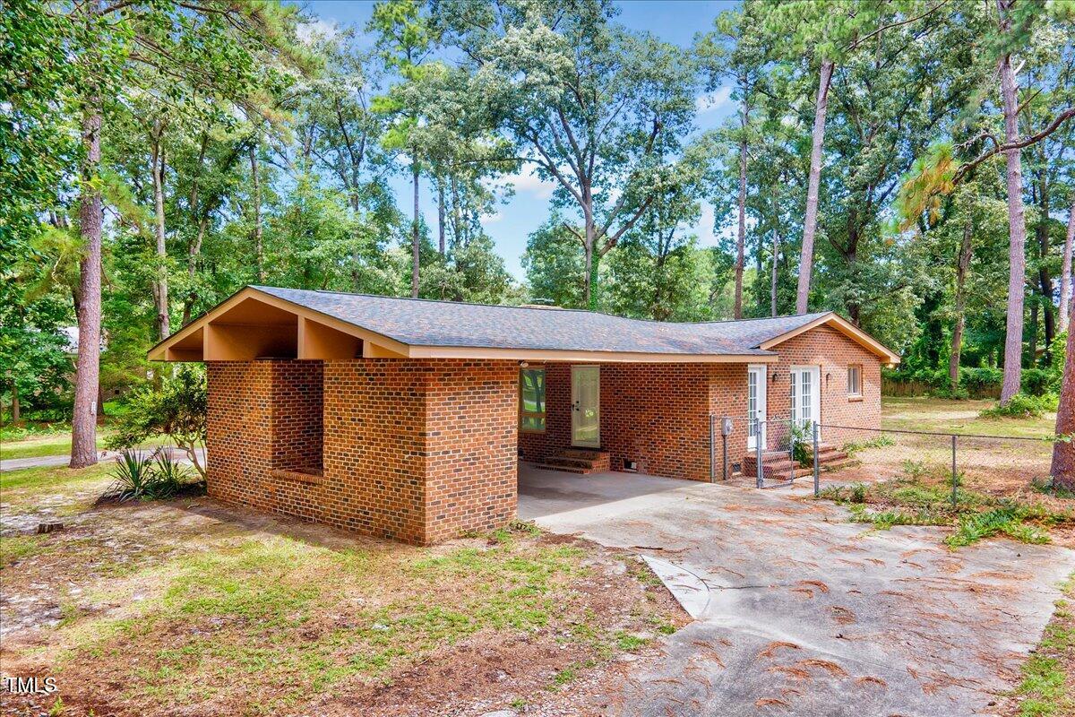 2585 Cabin Branch Road Kinston, NC 28504 - Photo 37 of 42 front view of a house with a yard