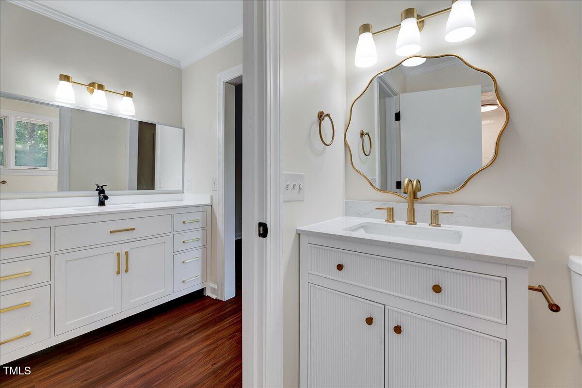 2585 Cabin Branch Road Kinston, NC 28504 - Photo 3 of 42 a bathroom with a double vanity sink mirror and