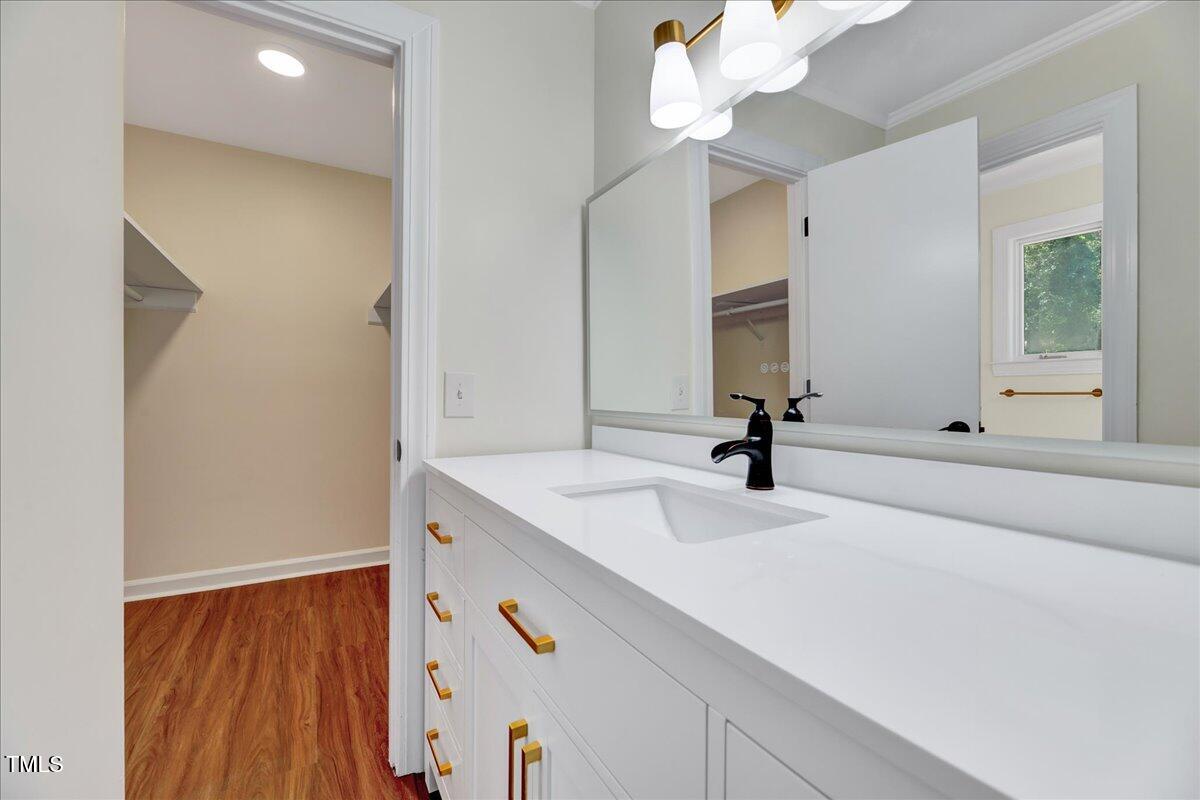 2585 Cabin Branch Road Kinston, NC 28504 - Photo 4 of 42 a bathroom with a sink and a mirror