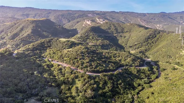 a view of a city with mountains in the background