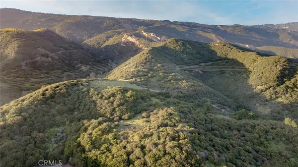 a view of a house with a mountain