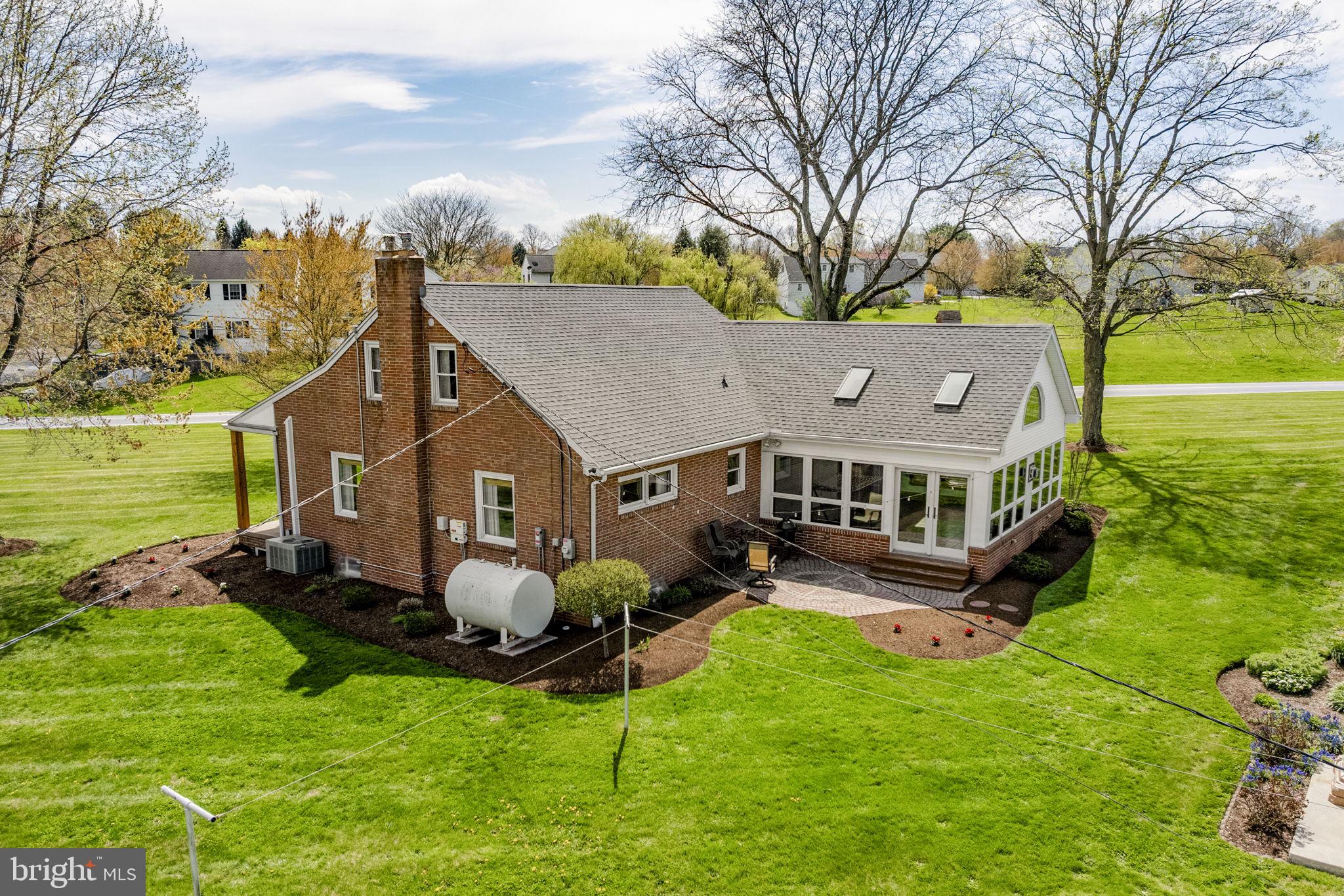 218 Lauschtown Road Denver, PA 17517 - Photo 13 of 78 a aerial view of a house with yard and a tree