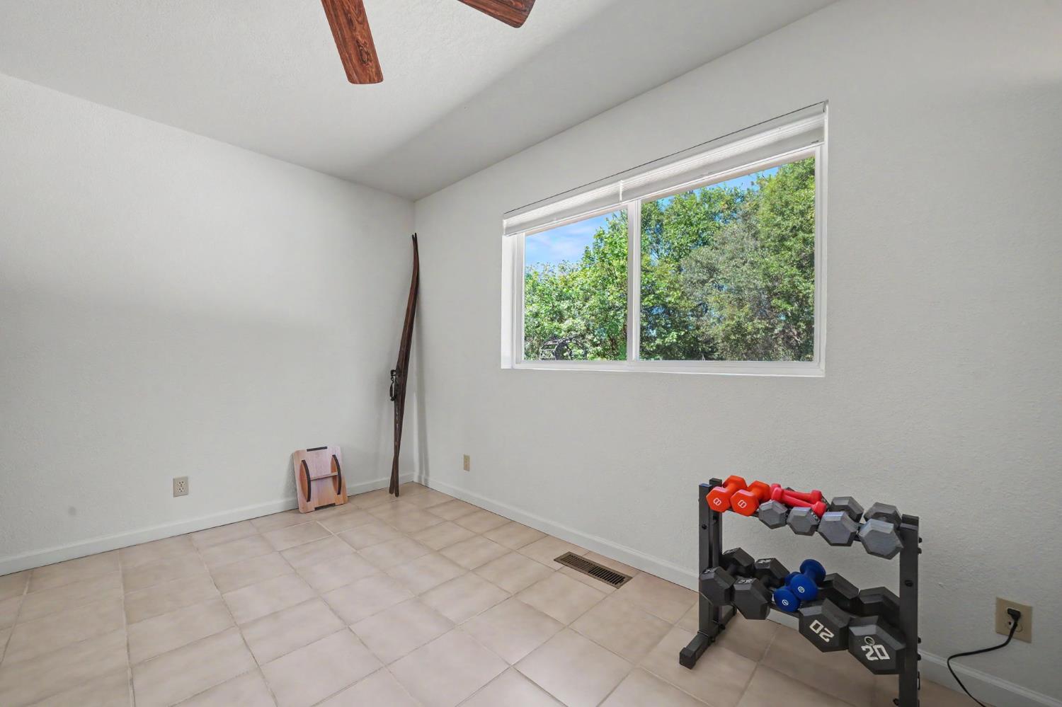 18299 West Clinton Road Jackson, CA 95642 - Photo 45 of 56 a view of a room with toys and a window