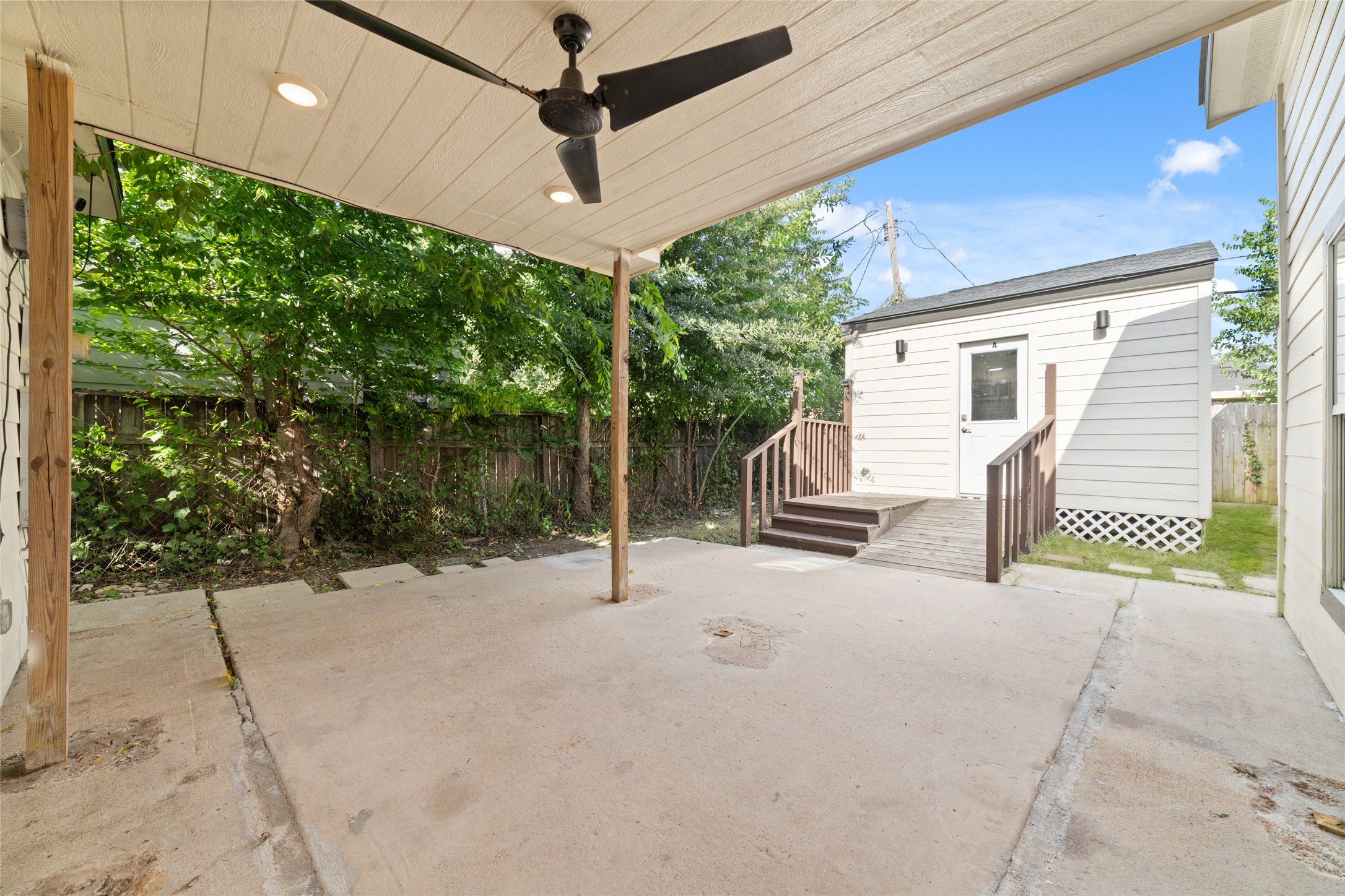 7125 Conley Street Houston, TX 77021 - Photo 18 of 32 The covered patio leads to one of the two dwellings that sit side by side.