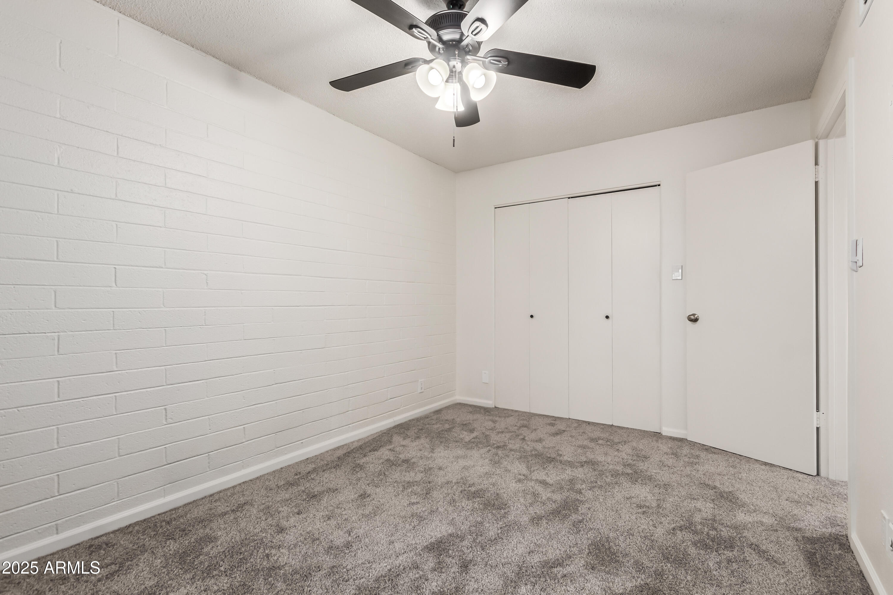 2608 West Berridge Lane, Unit C220 Phoenix, AZ 85017 - Photo 14 of 21 a view of an empty room