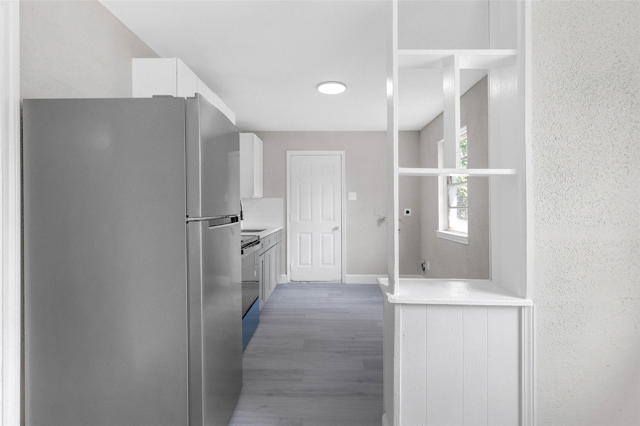 4755 Wilmington Street, Unit 16 Houston, TX 77033 - Photo 6 of 15 a view of a hallway