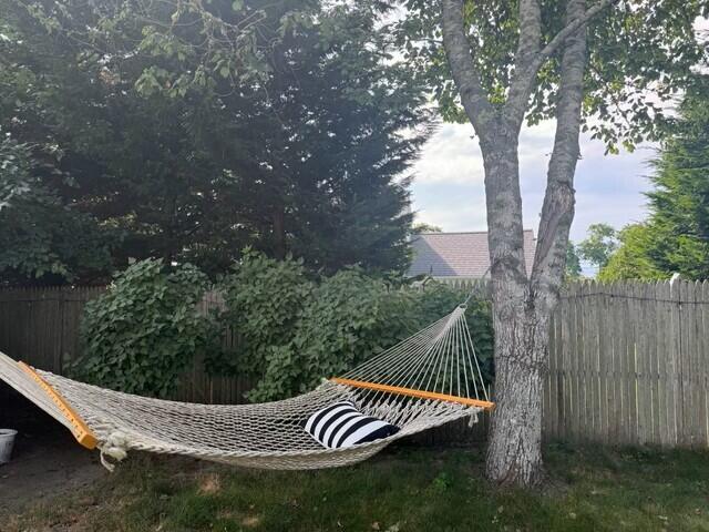 31 Susan Ruth Road Dennis Port, MA 02639 - Photo 14 of 17 31 Susanruth Rd - Backyard with hammock