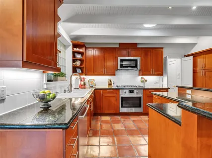 a dining room with furniture window wooden floor