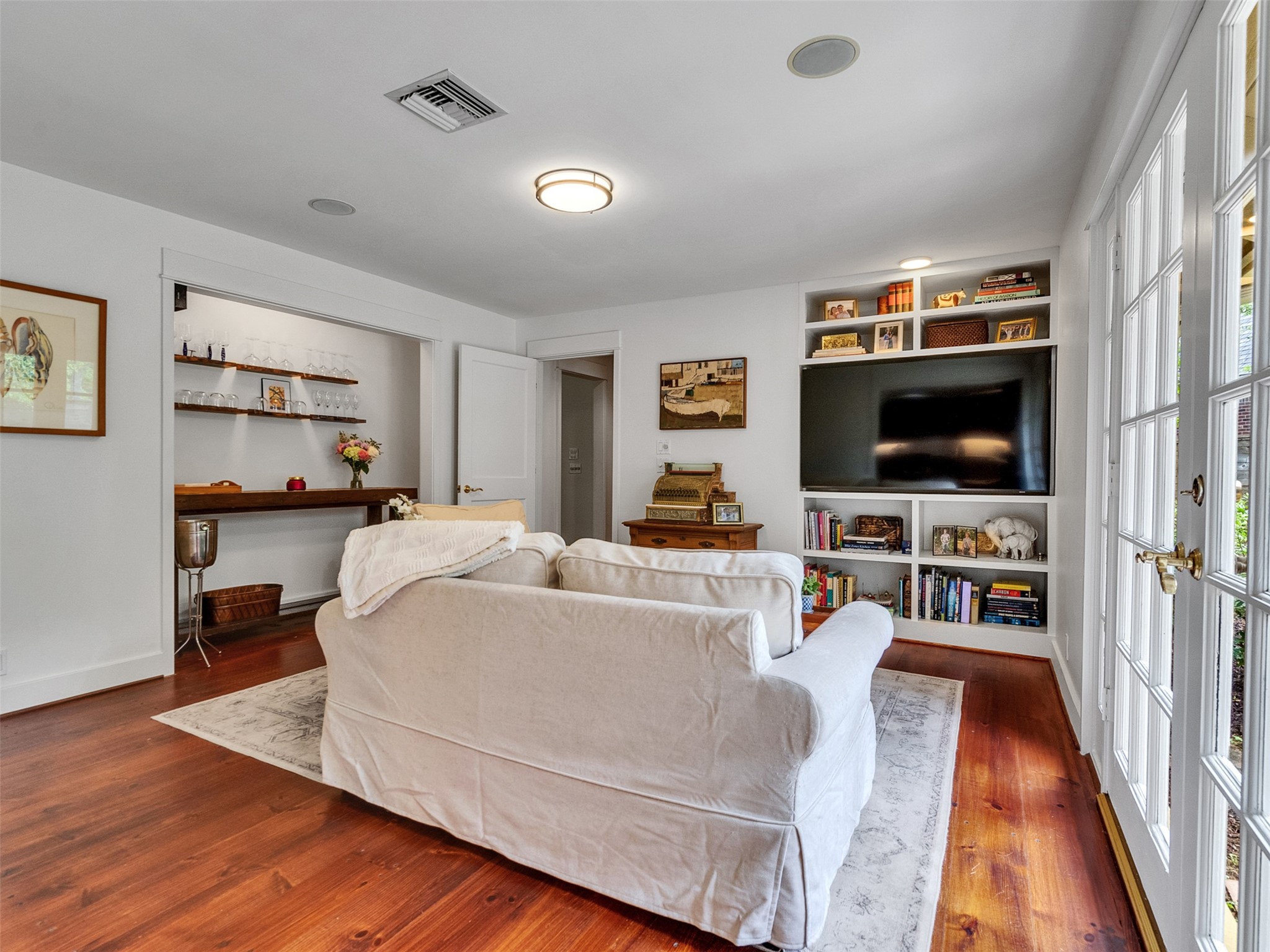 8202 Burkhart Road Houston, TX 77055 - Photo 7 of 29 The office is used as a parlor or sitting room and an extra TV area.