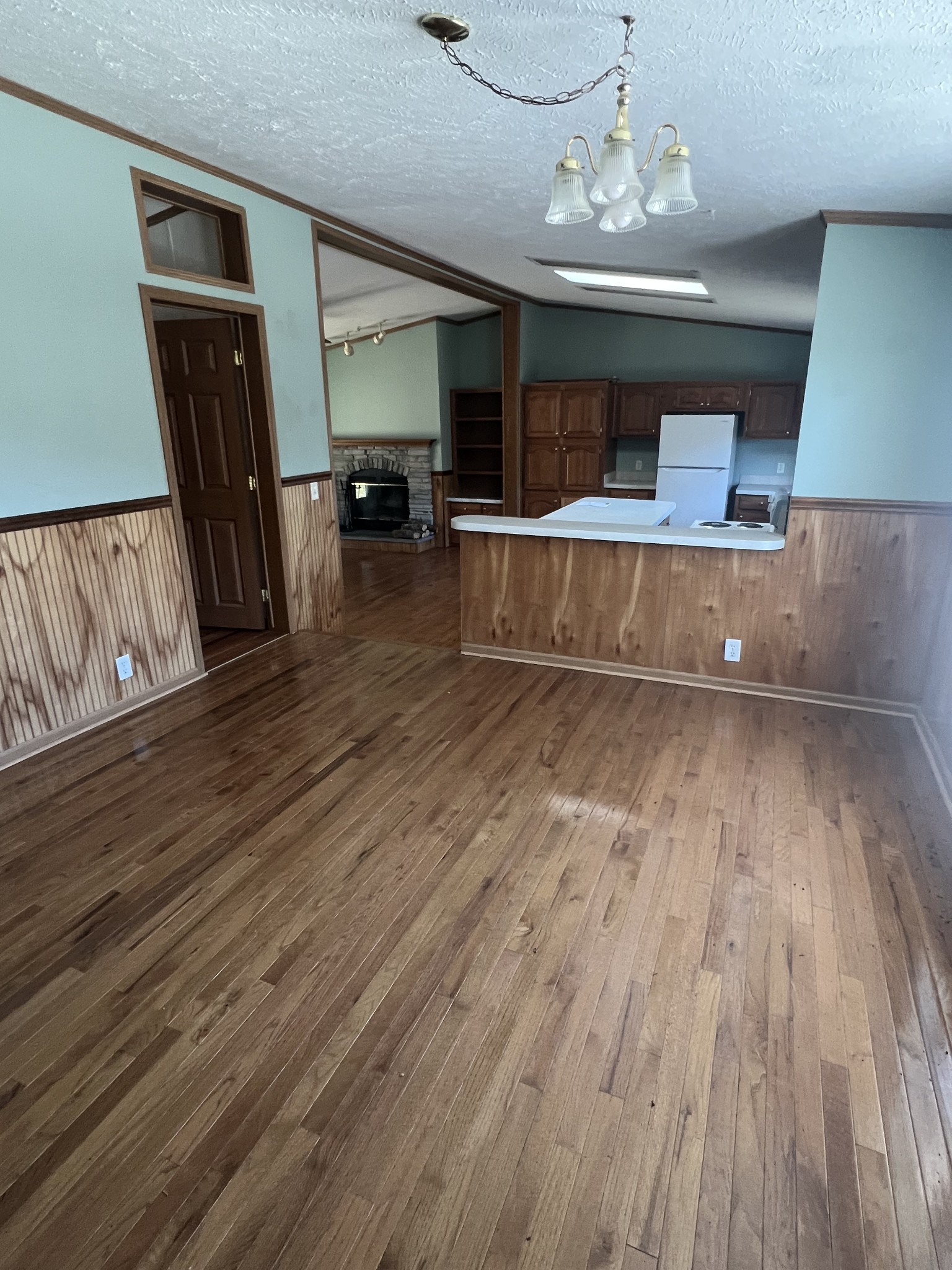 697 Club Springs Road Buffalo Valley, TN 38548 - Photo 11 of 29 a view of a living room a dining room with wooden floor