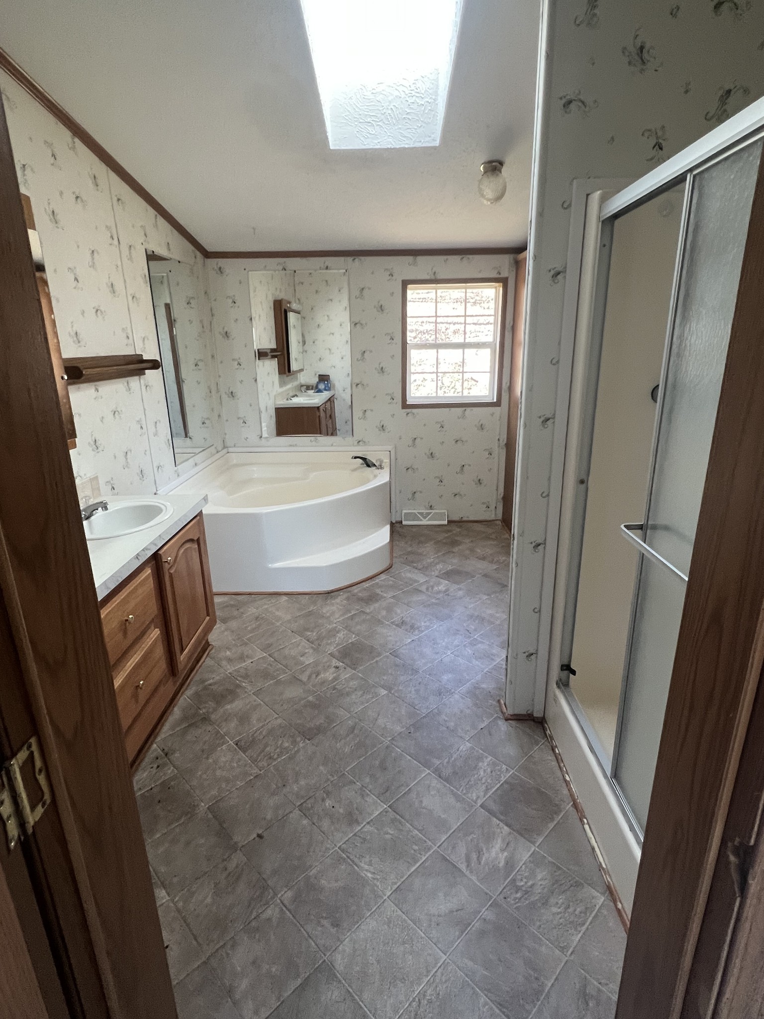 697 Club Springs Road Buffalo Valley, TN 38548 - Photo 14 of 29 a bathroom with a tub sink and mirror
