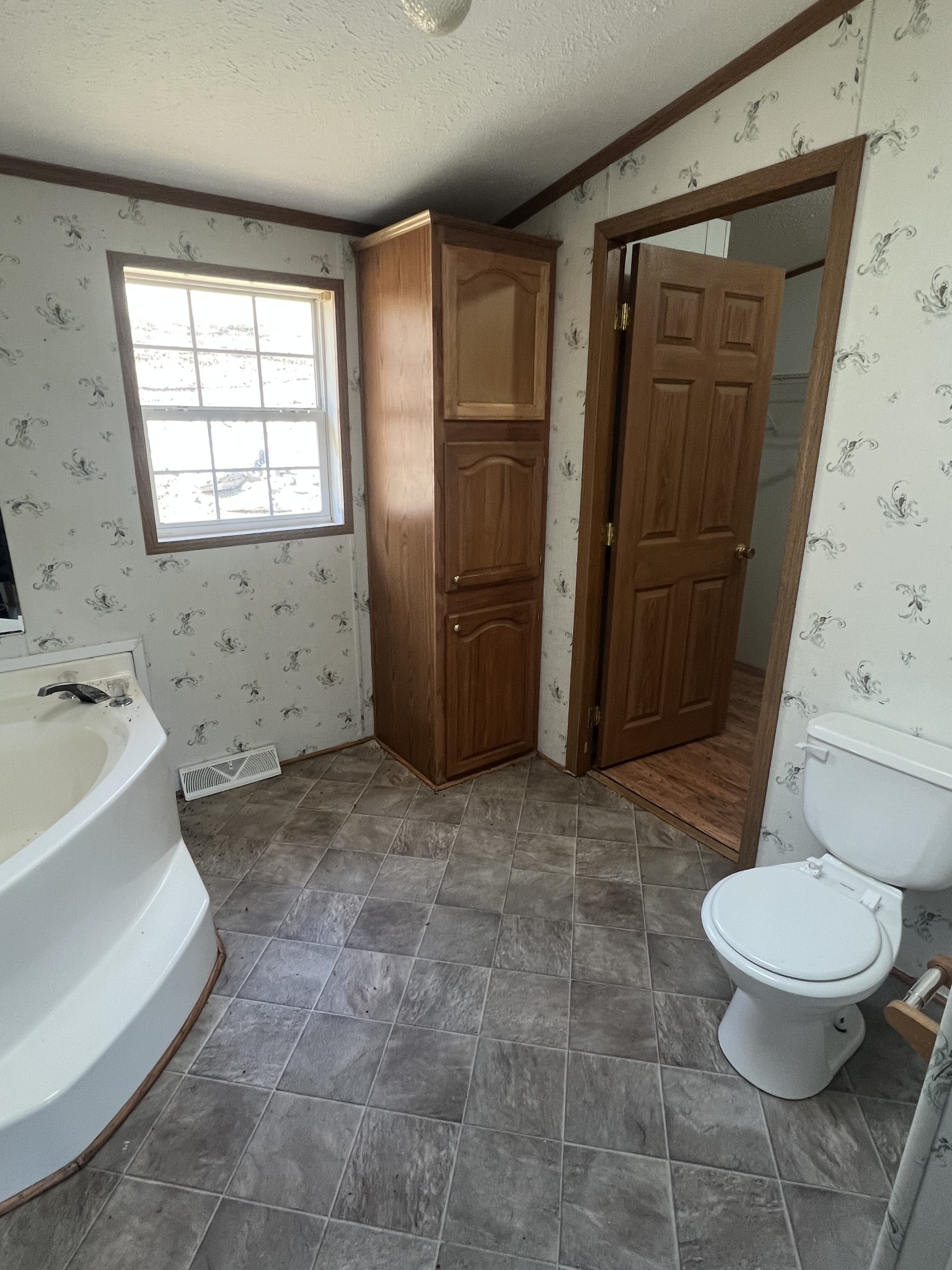 697 Club Springs Road Buffalo Valley, TN 38548 - Photo 15 of 29 a bathroom with a sink toilet and shower