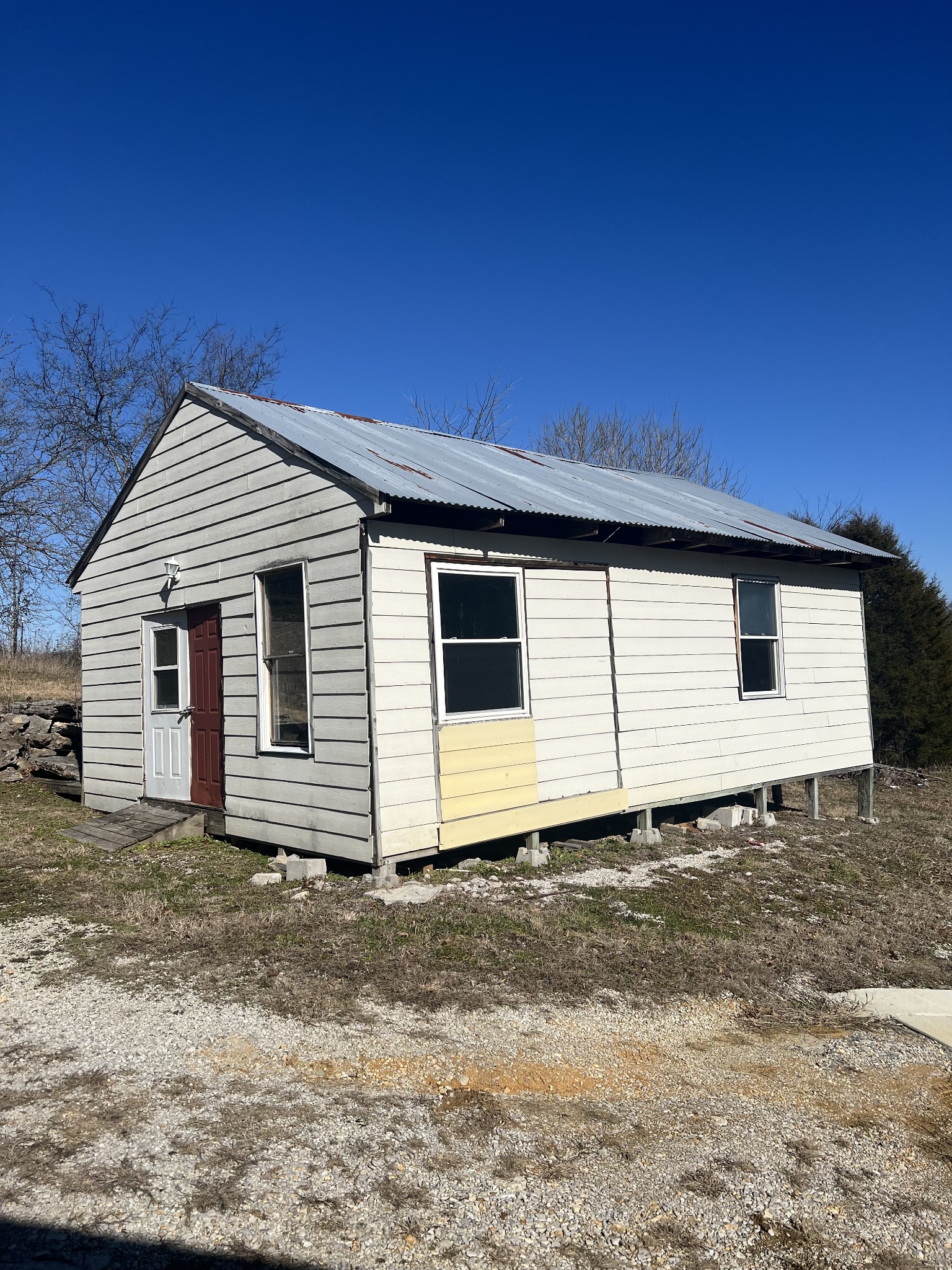 697 Club Springs Road Buffalo Valley, TN 38548 - Photo 23 of 29 a view of a house with a backyard