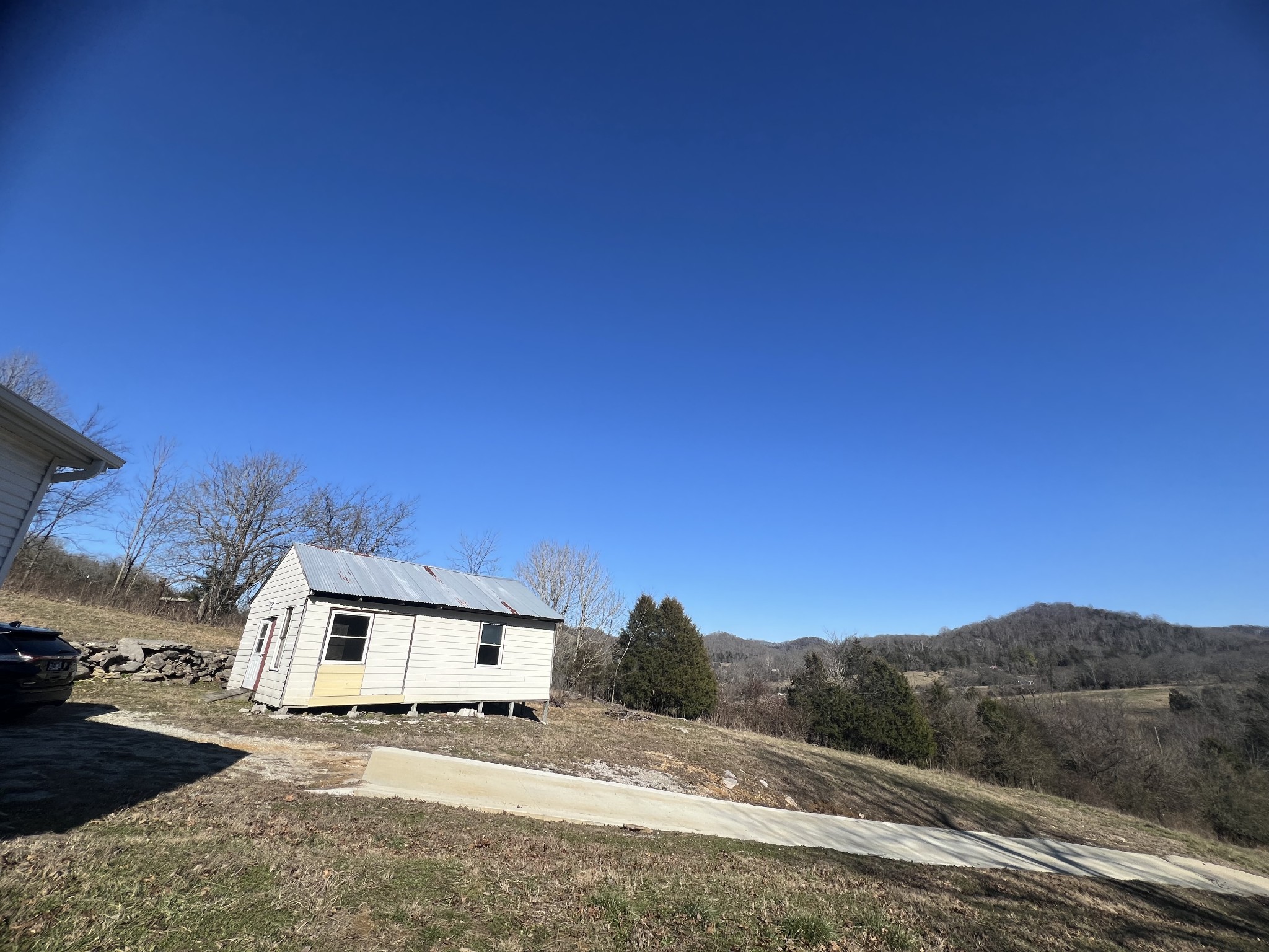 697 Club Springs Road Buffalo Valley, TN 38548 - Photo 24 of 29 a view of a house with a yard