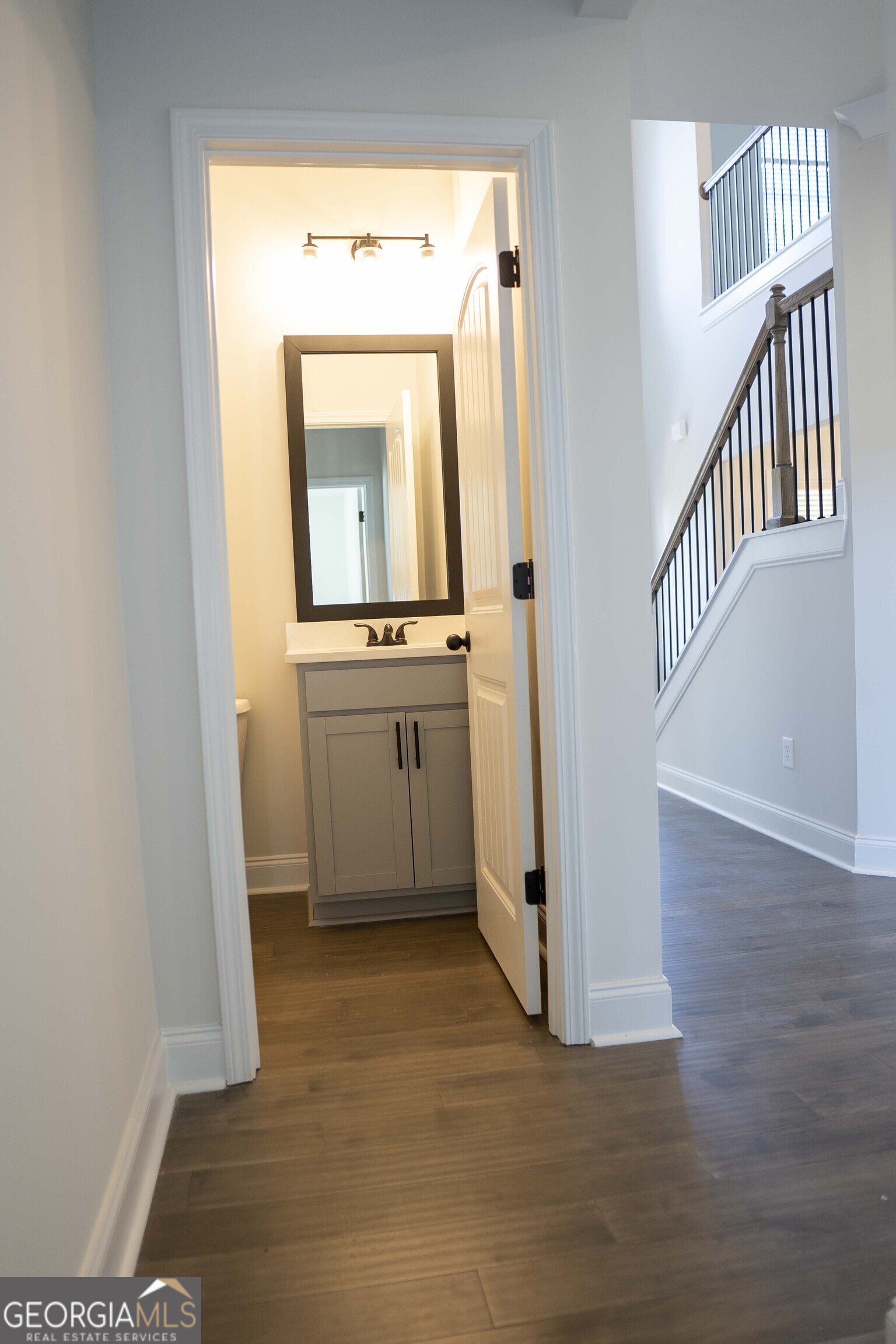 600 Beaver Court Perry, GA 31069 - Photo 26 of 48 a view of a hallway with entryway wooden floor and windows
