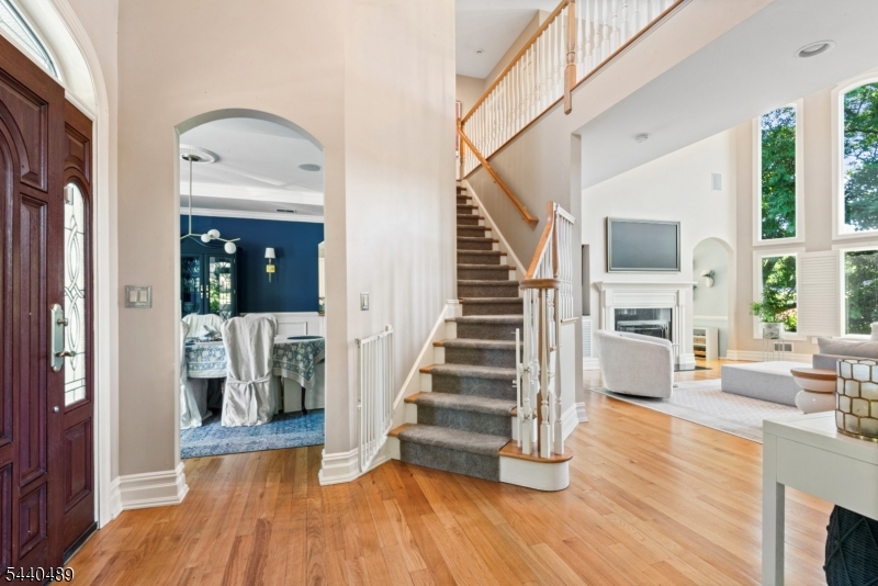 99 East Lindsley Road Cedar Grove, NJ 07009 - Photo 3 of 41 a view of entryway and hall with wooden floor