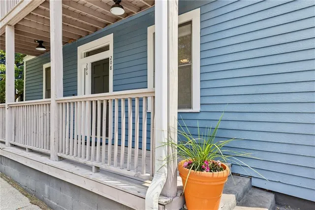 a view of a chair and table in the balcony